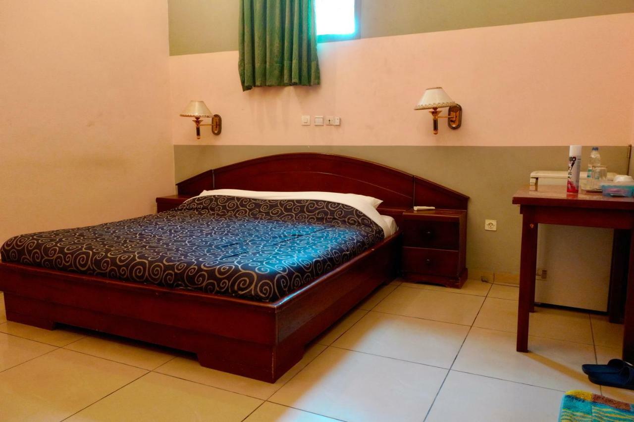 Petit Motel Beijing Abidjan Extérieur photo