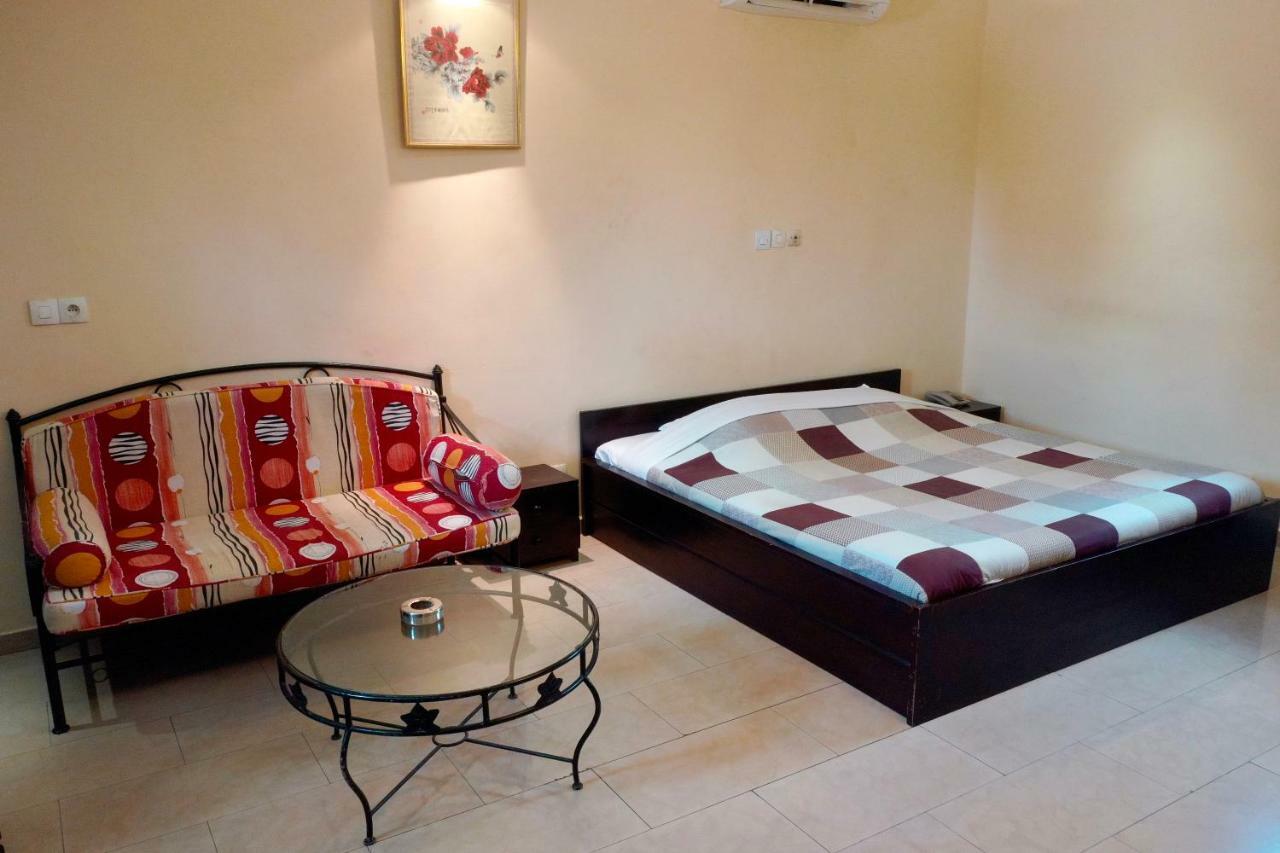 Petit Motel Beijing Abidjan Extérieur photo