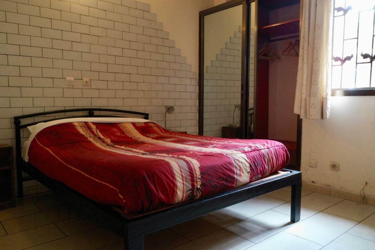 Petit Motel Beijing Abidjan Extérieur photo